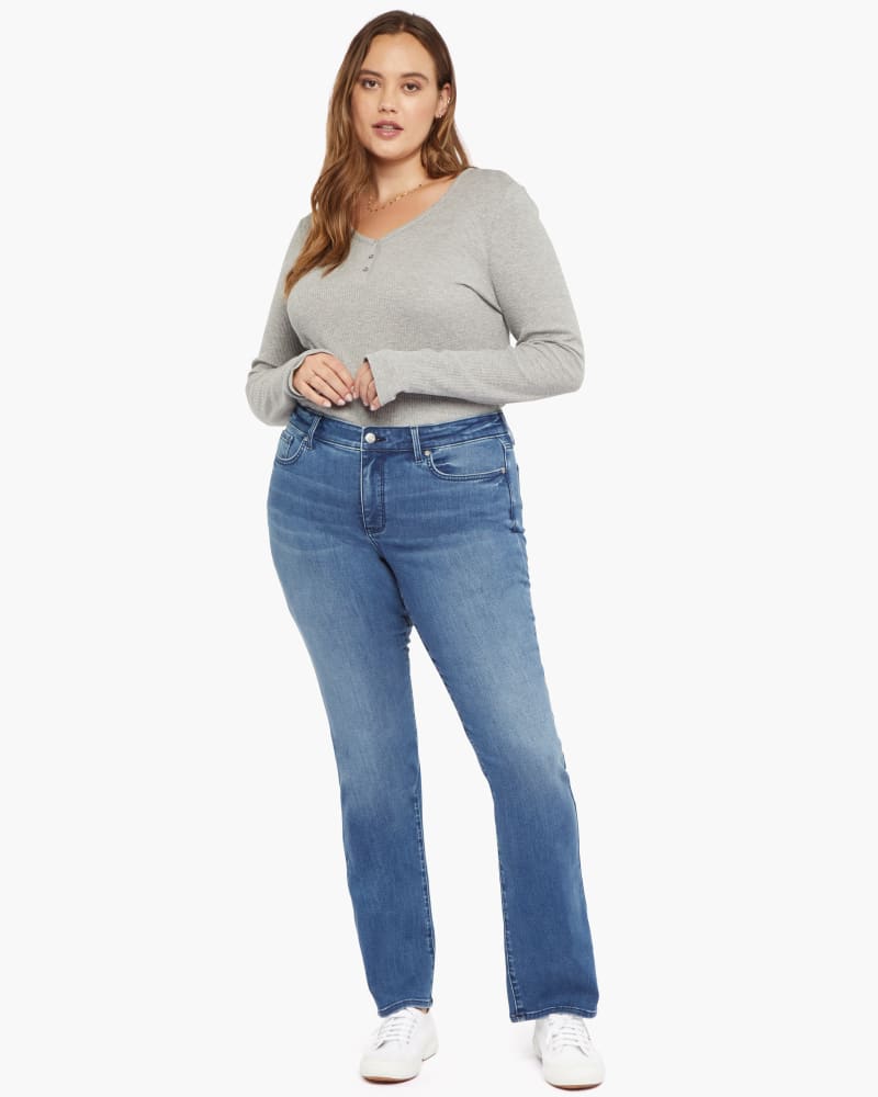 Front of a model wearing a size 14 Marilyn Flare Jean in Foundry by NYDJ. | dia_product_style_image_id:170762